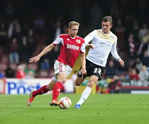 Bristol City V Colchester United Prints: Bristol City's Scott Wagstaff Sprints Past Colchester United's Alex Gilbey in League One Clash