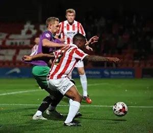 Framed Print : Bristol City's Scott Wagstaff vs Cheltenham Town's Craig Braham-Barrett - Intense Football Rivalry