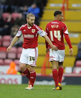 Bristol City's Simon Gillett and Bobby Reid in Action against MK Dons