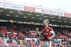 Bristol City V Gillingham Prints: Bristol City's Simon Gillett: Triumphant Celebration After Win Against Gillingham (March 1)