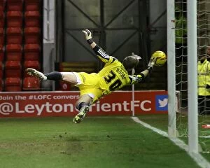 Images Dated 11th February 2014: Bristol City's Simon Moore Saves Shot at Leyton Orient, Sky Bet League One (11 February 2014)