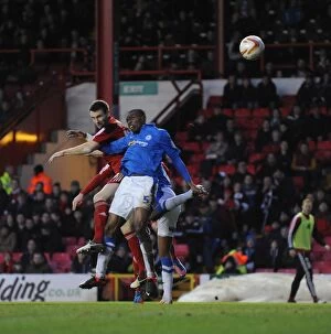 Images Dated 29th December 2012: Bristol City's Stephen McManus Heads in Third Goal vs Peterborough in Championship Match at Ashton
