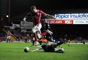 Bristol City V Millwall Prints: Bristol City's Stephen Pearson Dodges Paul Robinson's Challenge in Championship Clash