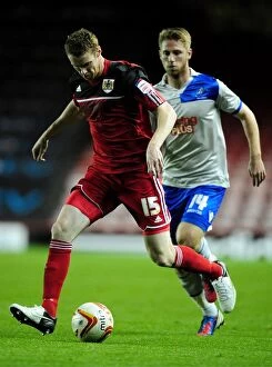 Images Dated 2nd October 2012: Bristol City's Stephen Pearson vs Millwall's James Henry - Championship Showdown, October 2012