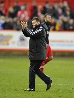 Images Dated 8th December 2013: Bristol City's Steve Cotterill Celebrates FA Cup Upset over Tamworth with Ecstatic Fans
