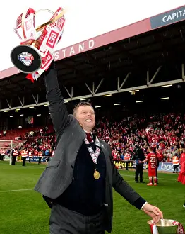 Bristol City's Steve Cotterill Lifts Sky Bet League One and JPT Trophies after Victory over Walsall