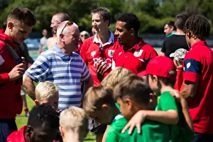 Framed Print : Bristol City's Steve Lansdown Celebrates First Pre-Season Win as Owner with Captain Korey Smith after Guernsey FC Match