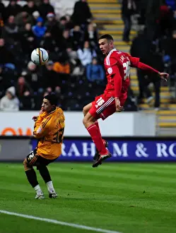 Framed Print : Bristol City's Steven Caulker Clears Ball in Championship Clash vs. Hull City (18 / 12 / 2010)