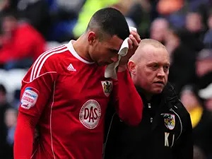 Preston V Bristol City Prints: Bristol City's Steven Caulker Sustains Head Injury During Preston North End Match
