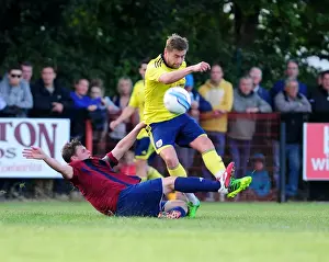 Ashton And Backwell United V Bristol City Prints: Bristol City's Steven Davies Faces Late Challenge in Pre-Season Friendly Against Ashton and Backwell United