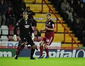 Images Dated 2nd October 2012: Bristol City's Steven Davies Scores Stunning Chipped Goal Past Millwall's David Forde