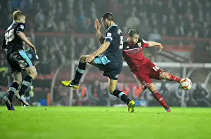 Bristol City's Steven Davies Shoots in Championship Clash Against Burnley