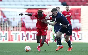 Bristol City's Tammy Abraham Outruns Barnsley's Angus MacDonald in Thrilling Championship Clash