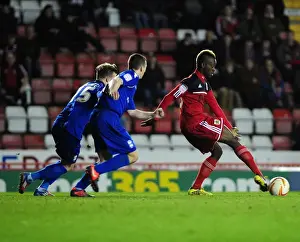 Bristol City V Birmingham City Prints: Bristol City's Toby Ajala Battles for Control Amidst Birmingham Pressure (Bristol City vs Birmingham City)