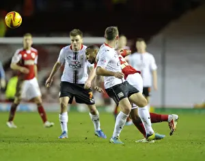 Bristol City's Tyrone Barnett Slips Past MK Dons Lee Hodson