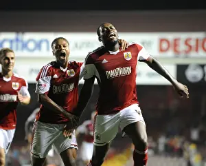 Round 2 Prints: Bristol City's Unforgettable Goal: Emmanuel-Thomas and Reid's Euphoric Celebration (2013)