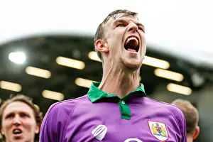 Fleetwood Town V Bristol City Prints: Bristol City's Unforgettable Moment: Aden Flint and Kieran Agard's Jubilant Goal Celebration vs