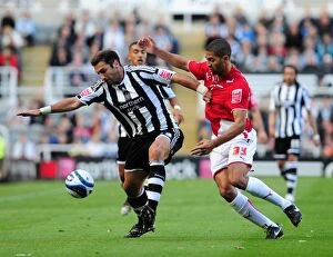 Newcastle Utd V Bristol City Collection: Bristol City's Unforgettable Rivalry Moment: Zurab Khizanishvili and Alvaro Saborio vs