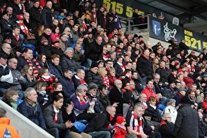 Images Dated 21st February 2015: Bristol City's Unstoppable Fans: A Sea of Passion at Colchester United's Stadium (February 2015)