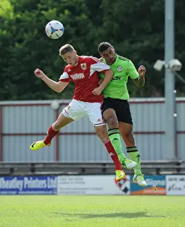 Forest Green Rovers V Bristol City Prints: Bristol City's Wes Burns and Forest Green Rovers Jamie Turley Battle for High Ball in Preseason Clash