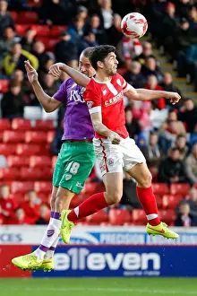 Barnsley V Bristol City Prints: Bristol City's Wilbraham and Barnsley's Dudgeon Clash in Aerial Showdown at Oakwell Stadium