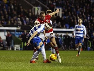 Images Dated 2nd January 2016: Bristol City's Wilbraham Fights for Possession against Reading Defenders in Sky Bet Championship