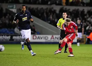 Millwall V Bristol City Prints: Bristol City's Woolford Thwarts by Millwall Keeper - Championship Clash, April 2011