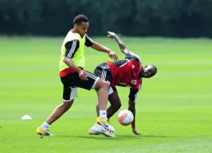 Pre-season Training Prints: Bristol Citys Yannick Bolasie battles for the ball with Bristol Citys Aaron Hollaway