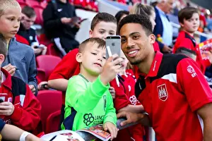 Bristol City's Zak Vyner Greets Fans with Autographs at Ashton Gate Stadium