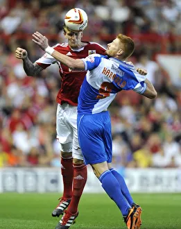 Bristol City V Bristol Rovers (Johnstone Paint Trophy 1ST Round) Prints: Bristol Derby: Aden Flint vs. Matt Harrold - Intense Battle for the High Ball at Ashton Gate