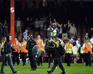 Images Dated 4th September 2013: Bristol Derby: Fans' Euphoria Halted by Police Horses at Ashton Gate