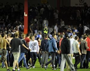 Images Dated 4th September 2013: Bristol Derby: Fans' Euphoria Halted by Police Horses at Ashton Gate