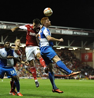 Bristol City V Bristol Rovers (Johnstone Paint Trophy 1ST Round) Prints: Bristol Derby: Intense Battle for the High Ball between Marlon Pack and Matt Harrold