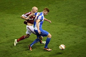 Bristol Derby: Intense Moment as James O'Connor Challenges Matt Harrold in Johnstones Paint Trophy Match at Ashton