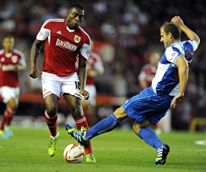 Bristol Derby: Intense Moment as McChrystal Tackles Emmanuel-Thomas in Johnstone Paint Trophy Match