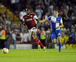 Images Dated 4th September 2013: Bristol Derby Showdown: A Battle Between Jay Emmanuel-Thomas and Tom Lockyer