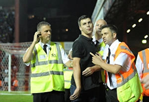 Bristol Derby: Tense Moment as Bristol Rovers Fan is Escorted by Stewards during Bristol City vs