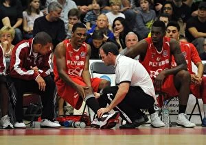Images Dated 15th November 2014: Bristol Flyers Doug Herring Suffers Injury on Court Against Cheshire Phoenix