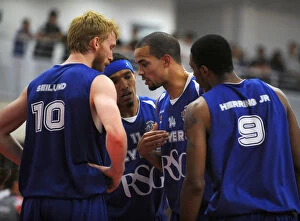 Bristol Flyers v Plymouth Raiders Collection: Bristol Flyers: Doug McLaughlin-Williams Conferring with Team Mates During Bristol Academy Flyers vs