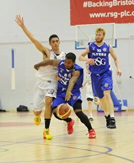 Images Dated 27th September 2014: Bristol Flyers Dwayne Lautier-Ogunleye Drives Forward in Basketball Action Against Plymouth Raiders