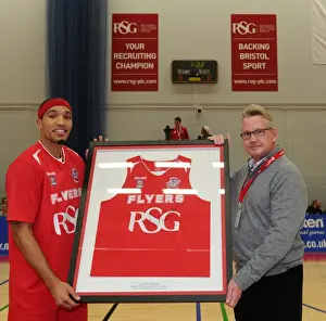 Bristol Flyers V Surrey United Prints: Bristol Flyers Greg Streete Presents Shirt to Opponents Surrey United - Basketball Action