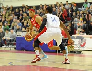 Images Dated 21st November 2014: Bristol Flyers vs Surrey United: Intense Basketball Action at SGS Wise Campus (November 2014)