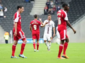 Brothers in Football: Sam and George Baldock Celebrate Together After Milton Keynes Dons vs. Bristol City
