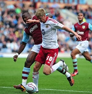Images Dated 25th September 2010: Burnley vs. Bristol City: Jon Stead Foul by Andre Bikey - Championship Football Match, Turf Moor