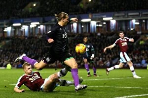 Images Dated 28th December 2015: Burnley vs. Bristol City: Luke Freeman Tackled by Ben Mee