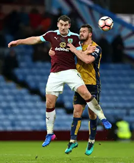 Burnley Prints: Burnley's Sam Vokes and Bailey Wright of Bristol City Clash in FA Cup Fourth Round at Turf Moor