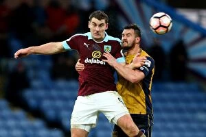 Images Dated 28th January 2017: Burnley's Sam Vokes and Bristol City's Bailey Wright Clash in FA Cup Fourth Round at Turf Moor