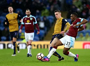 Burnley Prints: Burnley's Tendayi Darikwa Clashes with Bristol City's Joe Bryan at Turf Moor