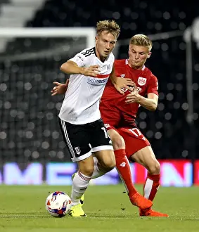 Fulham V Bristol City EFL Cup Prints: Cauley Woodrow vs Taylor Moore: A Battle at Craven Cottage - Fulham vs Bristol City EFL Cup Clash