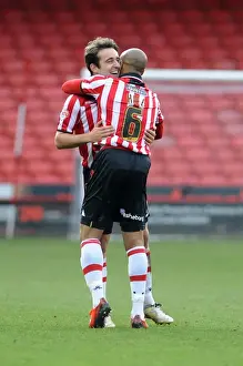 Celebrating Glory: Hill and Baxter Reunite in Sheffield United's Victory over Bristol City